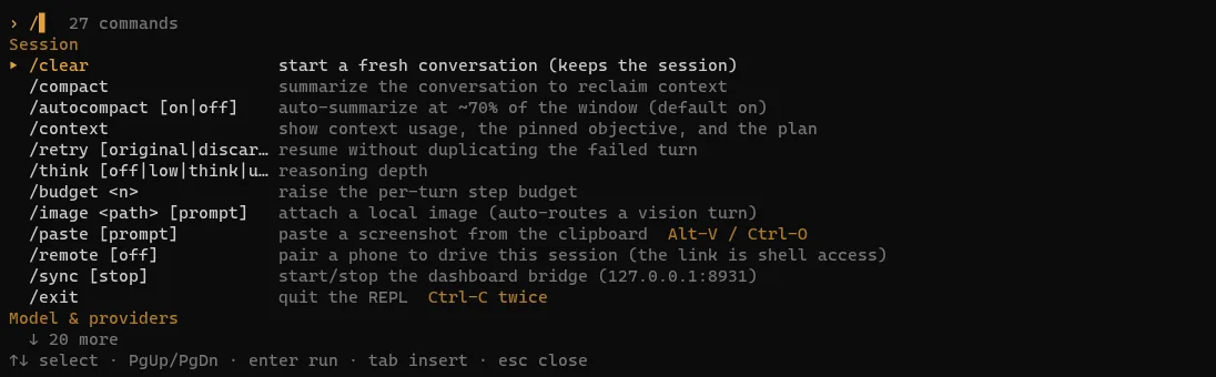 The command menu open after typing a slash: 27 commands, the Session group listing /clear, /compact, /context, /retry, /remote, /sync and more, each with a one-line description.